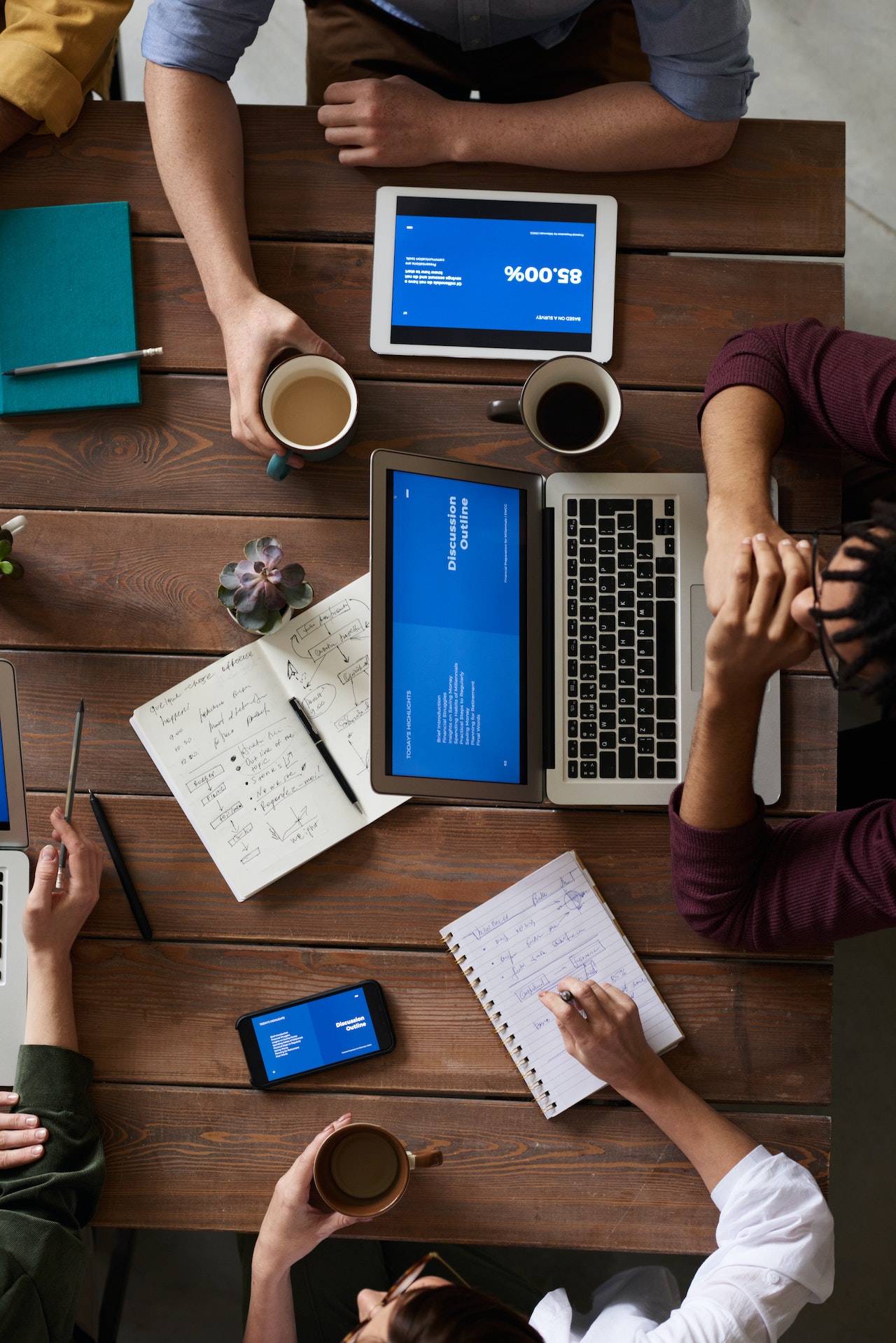 People working around a desk